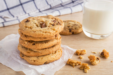 Chocolate chip cookie with almond and milk glass