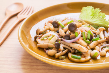 Spicy mushroom salad on plate, Thai food style