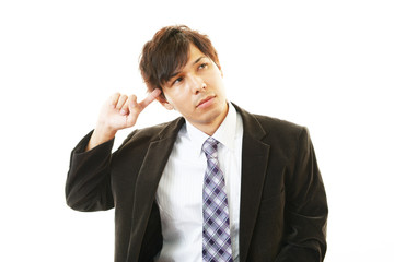 頭痛を訴えるビジネスマン