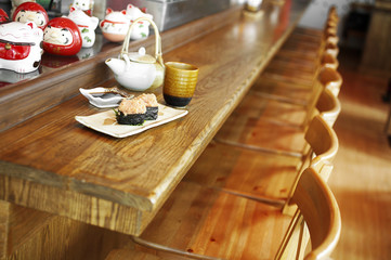 japanese sushi from fish egg on ceramic dish in restaurant