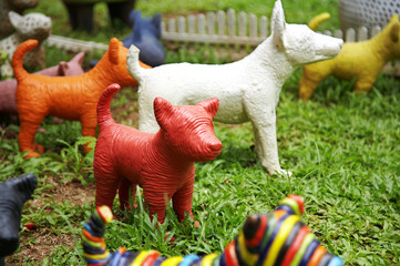 dog ceramic doll in garden