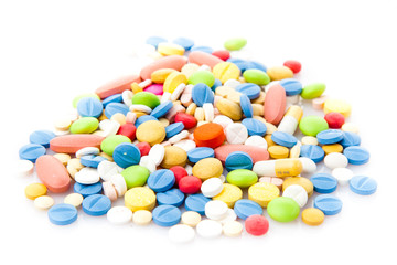 colorful pills isolated on white