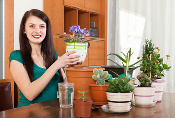  girl working with  viola flowers