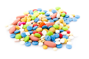  Pile of various colorful pills isolated on white