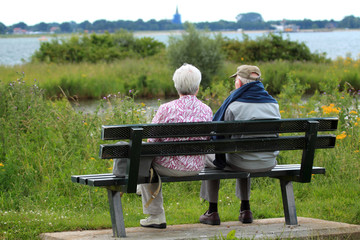 Two people on a bench