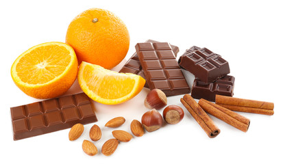 Chocolate, orange and nuts isolated on white