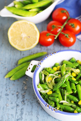 Salad with green beans and corn, and sauce