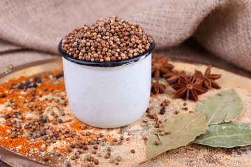 Metal round mug full of seasoning