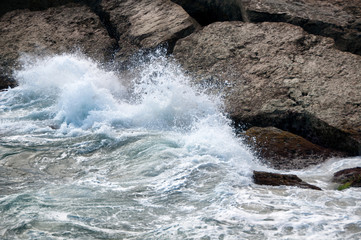 Waves breaking on the shore