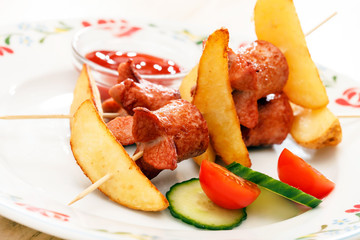 fried sausages with potatoes for kids menu