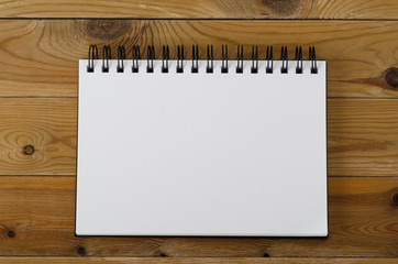 Blank Page Notebook on Wood