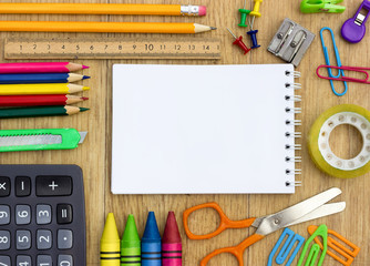 school supplies and checked notebook