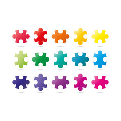 Rainbow puzzle pieces isolated on white background