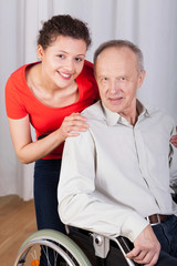 Smiling grandpa and granddaughter
