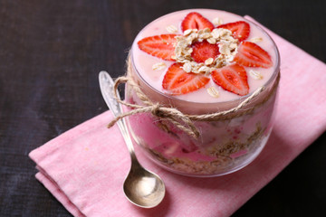 Healthy breakfast - yogurt with  strawberries and muesli served