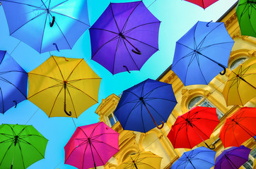 Fototapeta na wymiar Umbrellas in the air