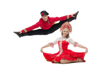 Couple of dancers in russian traditional costumes. 