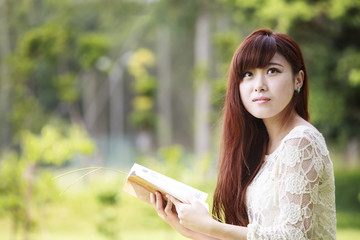 Obraz premium Outdoor summer portrait of young pretty cute girl