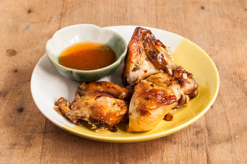 Grilled chicken on dish.