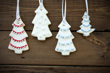 Four Christmas Tree Cookies on Wood