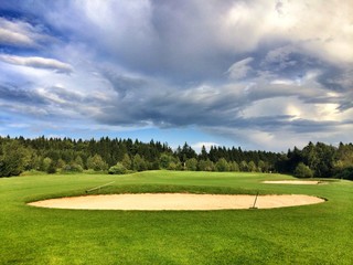 On the golf course at sunset