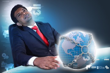 Business man with earth globe close in chain