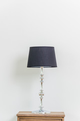 Lamp on bedside table