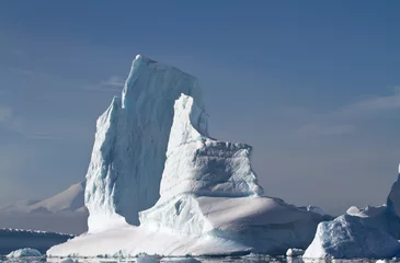 Foto op Canvas large iceberg in a sunny summer day near the Antarctic Peninsula © Tarpan