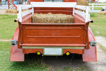 straw in red truck