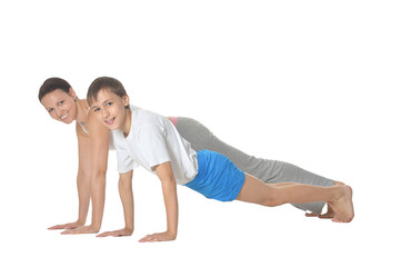 Mother and son exercising