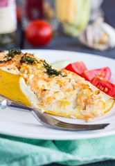 stuffed zucchini with chicken and vegetables close up