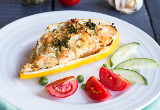 stuffed zucchini with chicken and vegetables, horizontally