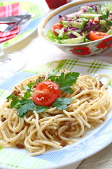 Spaghetti with meat and vegetable salad