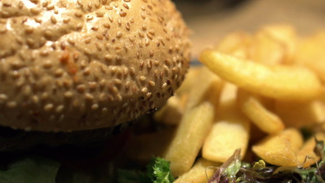 Close up of tasty hamburger and french fries
