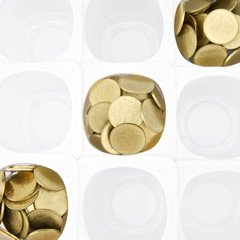 Gold coin in white cup