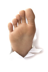 Foot with thumb up through a hole in paper