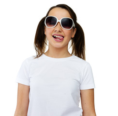 Smiling pretty young girl in trendy sunglasses
