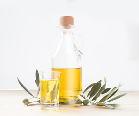 Glass bottle of olive oil.