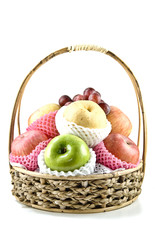 fresh fruits in basket, isolated on white