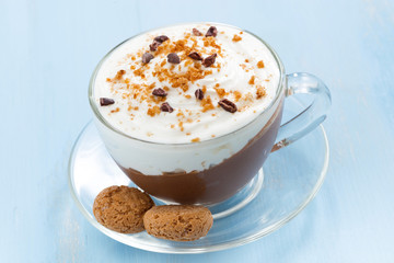 chocolate dessert with cream and amaretti in cup