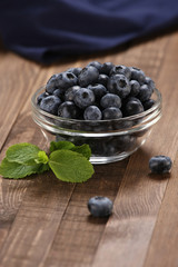 Fresh blueberries in a glass bowl