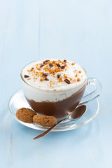 chocolate dessert with cream and amaretti in glass cup