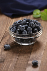 Fresh blueberries in a glass bowl