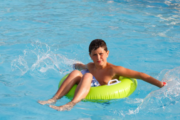 Boys swimsuit floating in the pool float