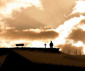 Fototapeta na wymiar Silhouette of Man with Sun Light In Background