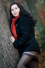 Fototapeta premium Youn beautiful brunette in autumn