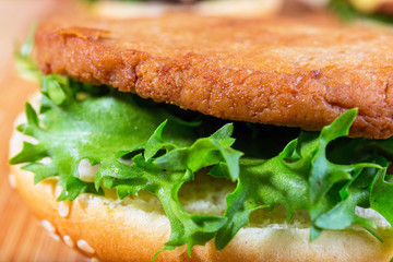 close up of hamburger on white plate