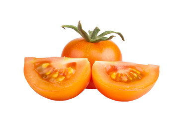 two slices and a whole tomato isolated on white background
