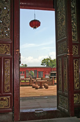 20o7: Fragment of a temple courtyard with sacrifice caldron and