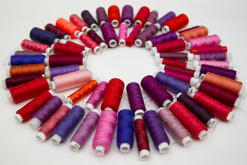 Background of colorful spools of thread